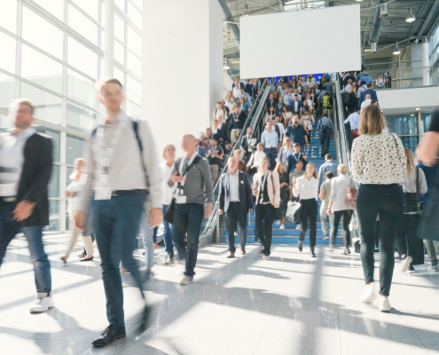 blurred business people at a trade fair
