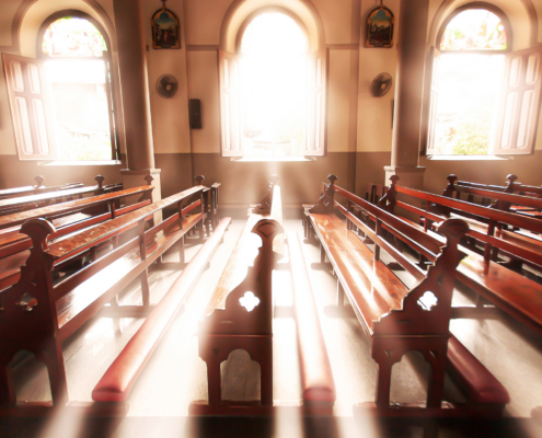 Ancient church interior at sunrise